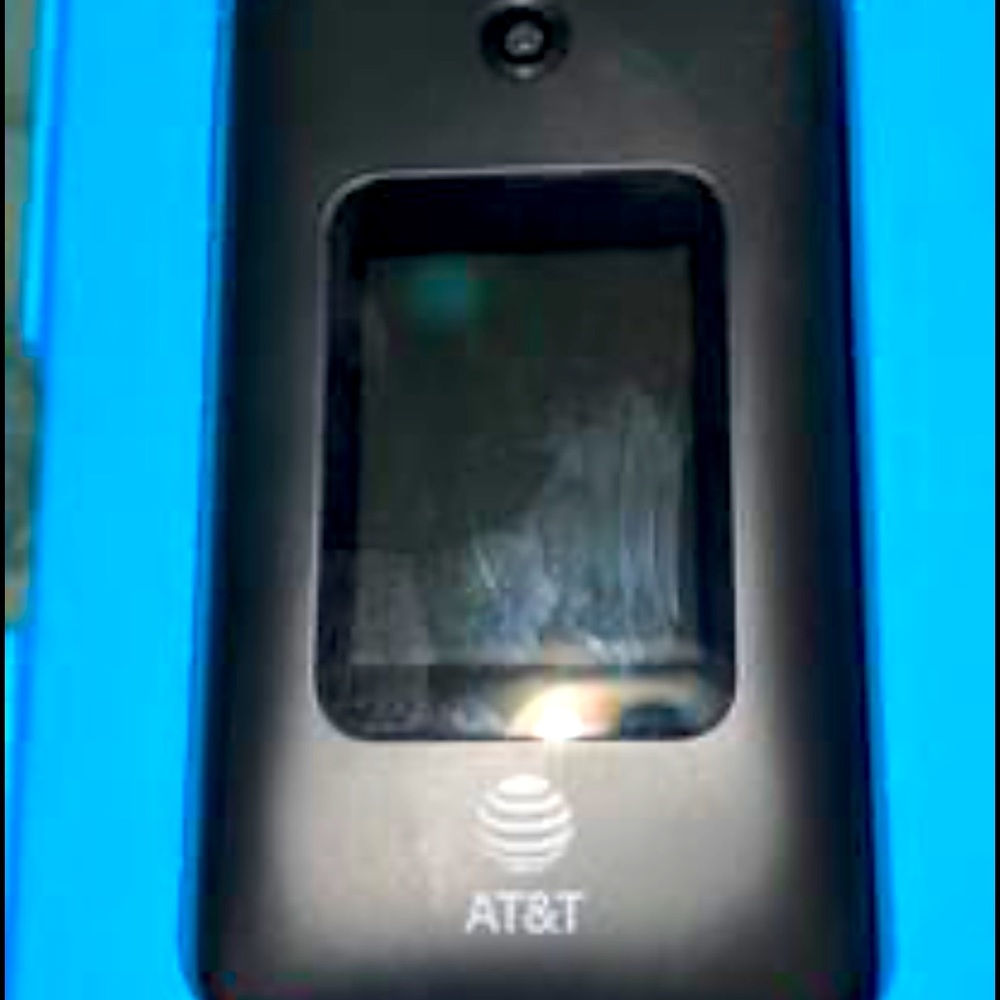 New flip phone. Used 1 week. Purchase AT&T store.